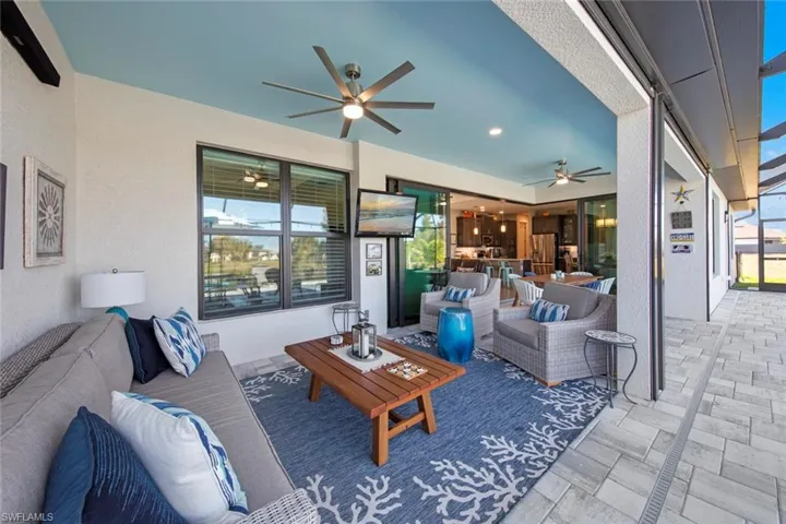 Living room featuring ceiling fan