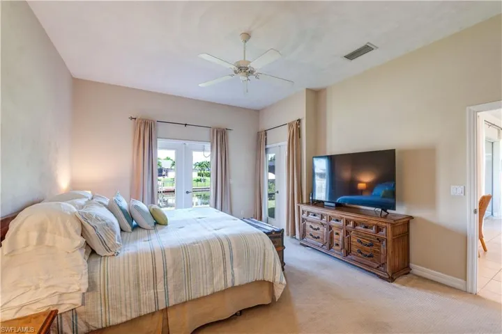Master bedroom with French doors to rear lanai