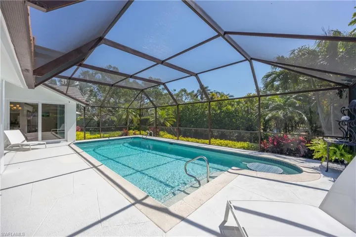 Outdoor pool with a patio area
