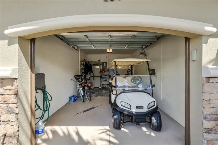 Attached 1 car garage. Golf cart for sale on separate agreement.