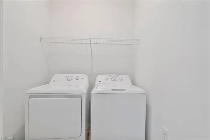 Laundry area featuring a wire shelf