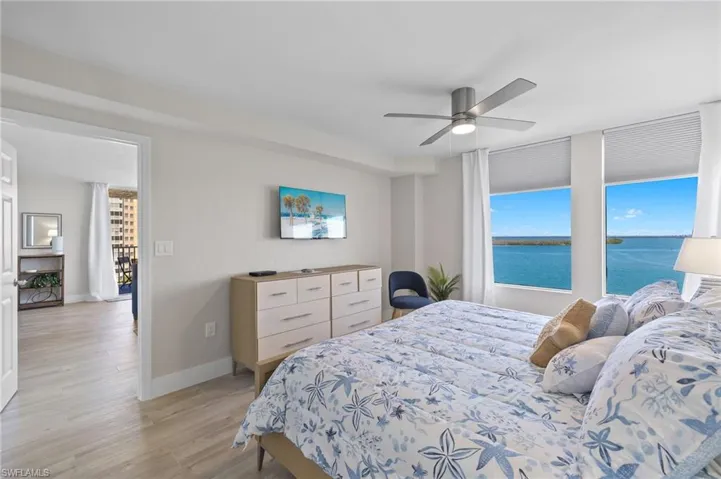 Bedroom featuring ceiling fan and light wood-type flooring