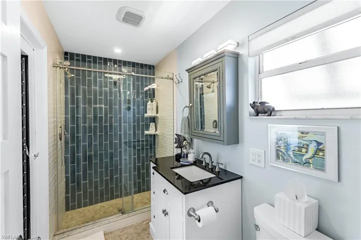 Bathroom # 2 in the primary suite has lanai access too