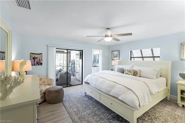 Bright luxurious primary suite opens to the lanai