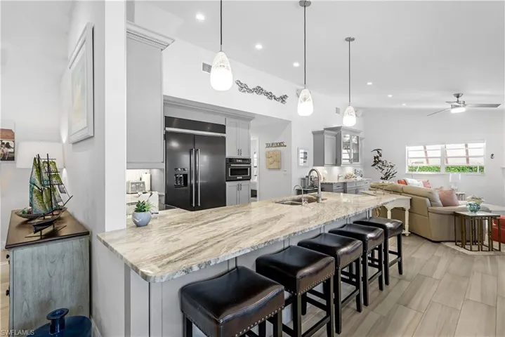 another angle of the kitchen showcasing the custom lighting