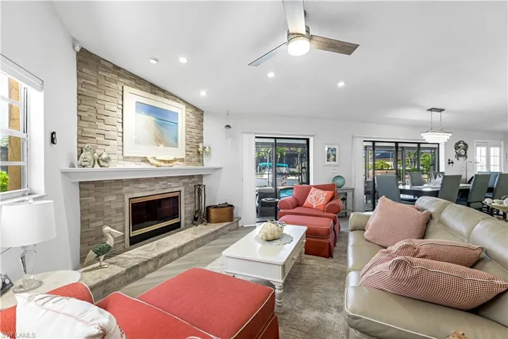 magnificent social room with a comforting wood burning fireplace as a showpiece