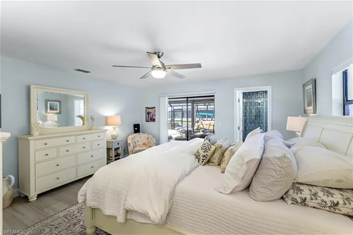 This unique primary suite has his and her bathrooms