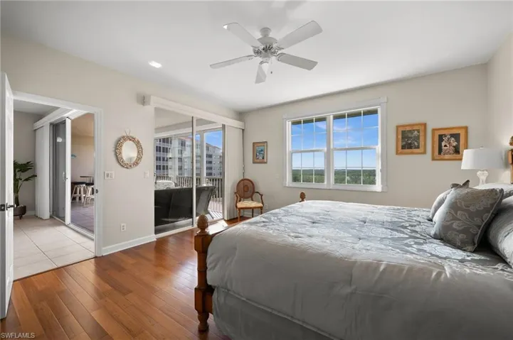 Master bedroom with doors to balcony