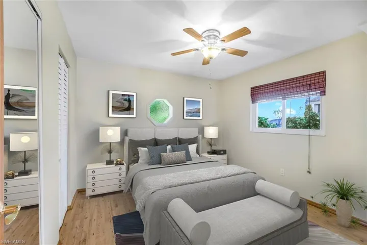 VIRTUAL STAGING Bedroom with light wood-type flooring, a ceiling fan, and baseboards