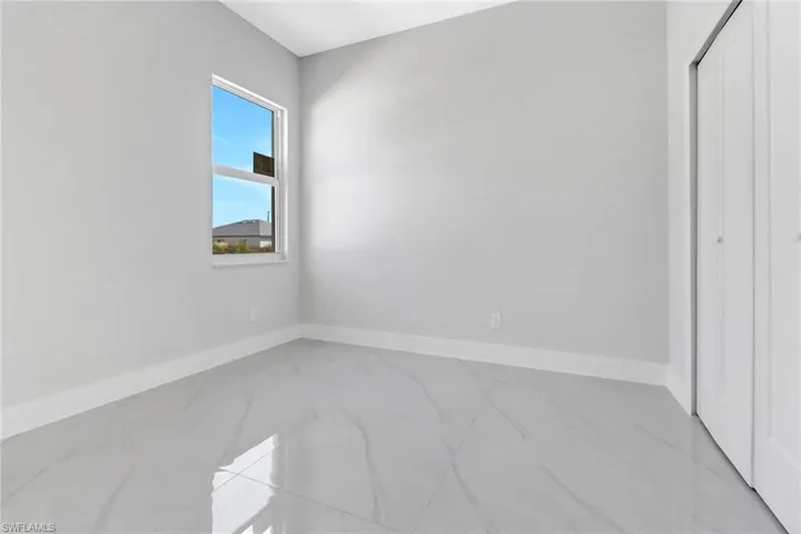 Unfurnished bedroom featuring a closet