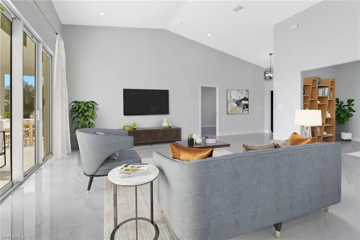 Living room with vaulted ceiling