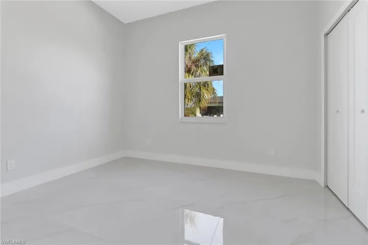 Unfurnished bedroom featuring a closet