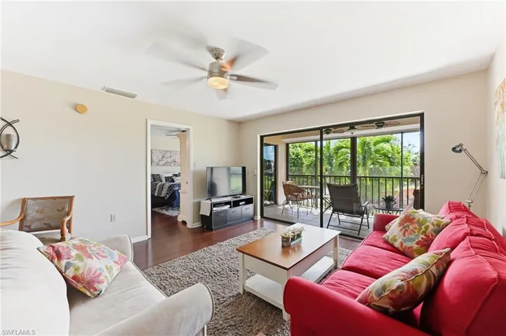 Living room featuring bright views from the lanai