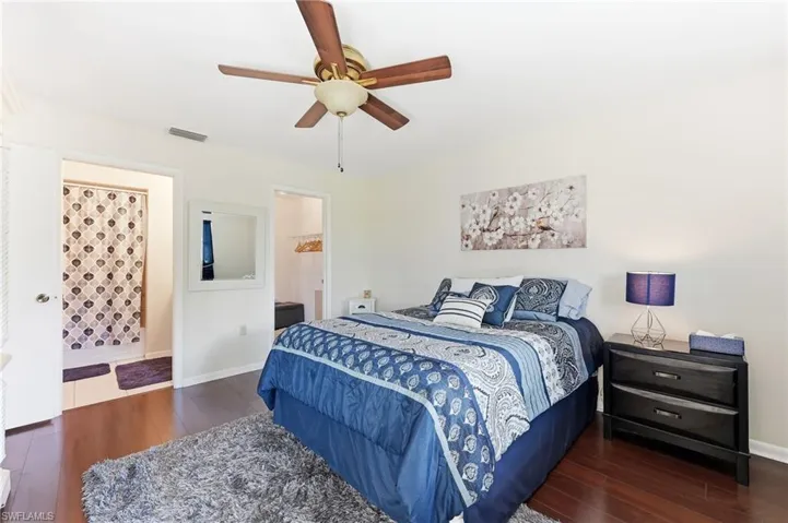 Primary suite with private bath and walk-in closet