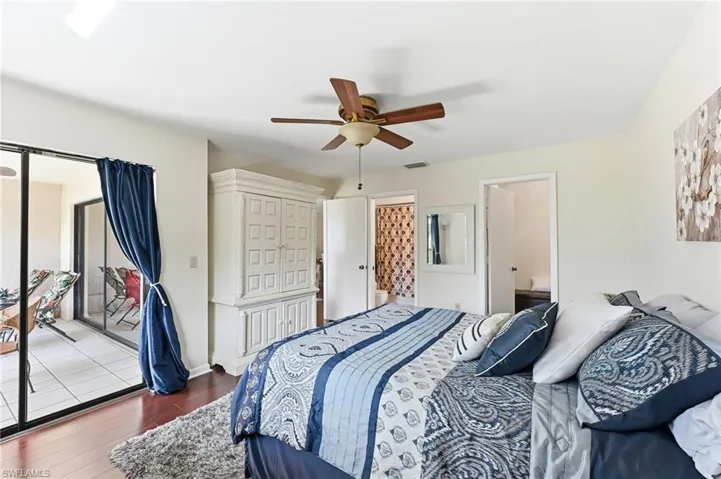 Spacious primary suite with direct access to the screened lanai