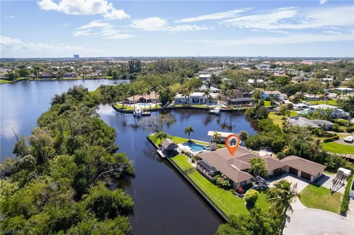 Aerial view with a residential view and a water view