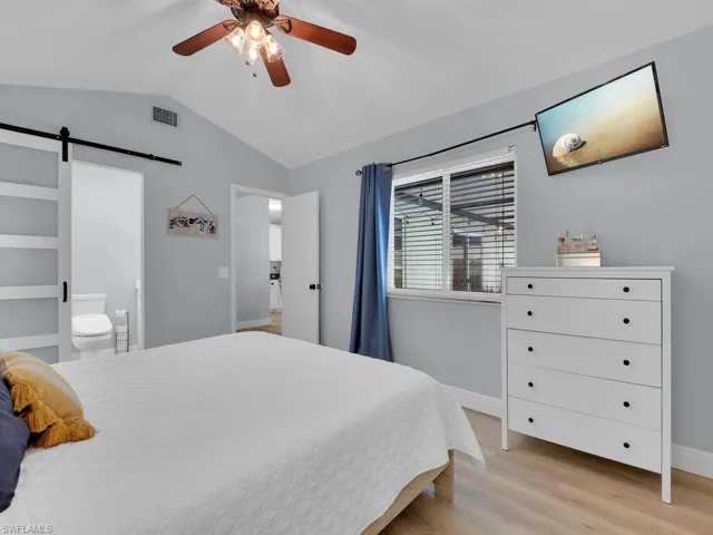 Sliding barn door to the bathroom.