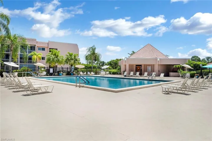 Community pool featuring a patio area