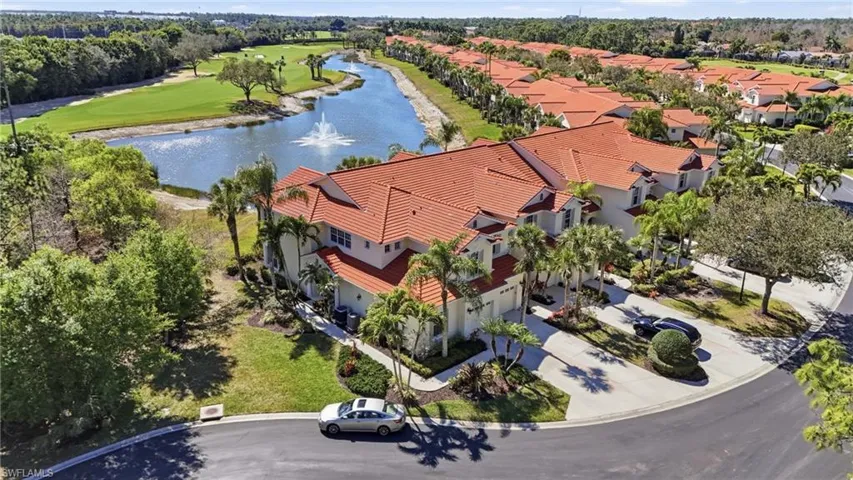 Bird's eye view of a nearby body of water and a golf course