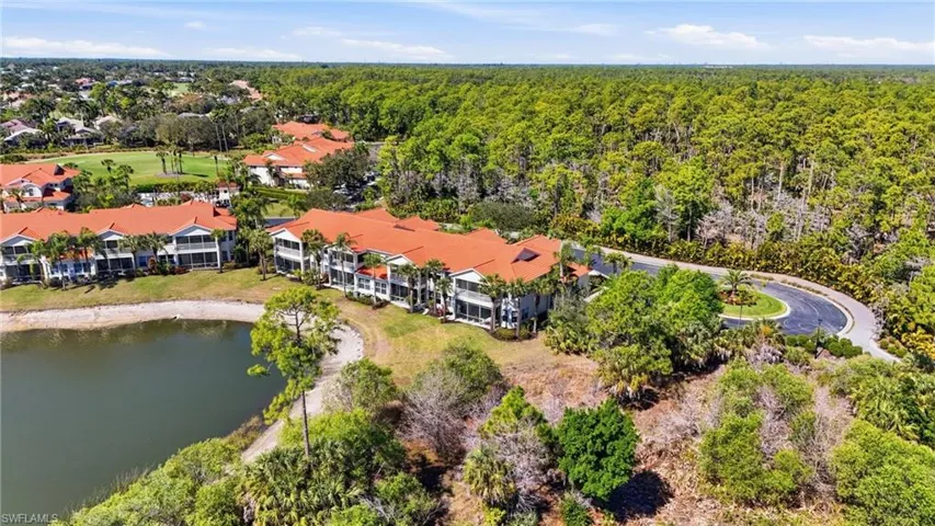 Bird's eye view of a large body of water and a heavily wooded area