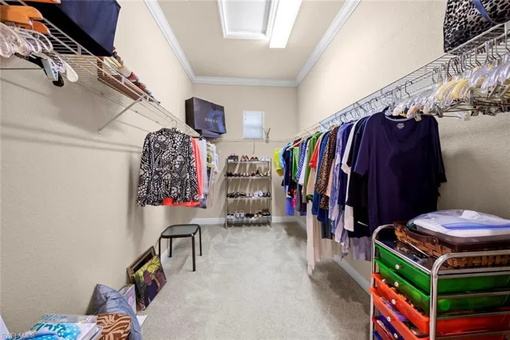 Large primary bedroom walk in closet