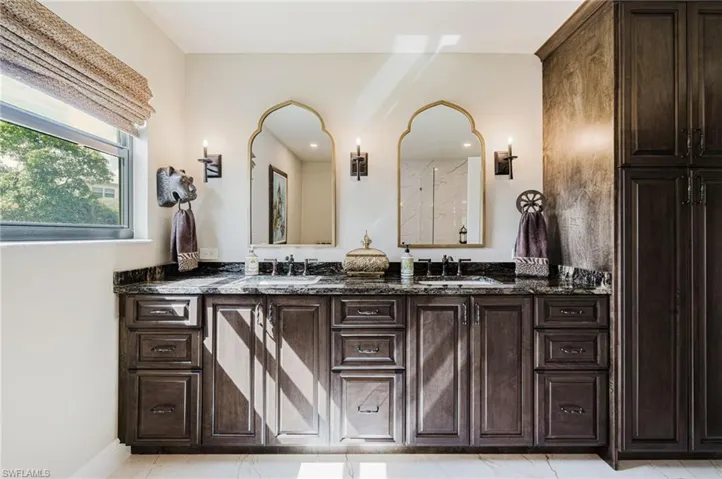 Bathroom featuring double vanity