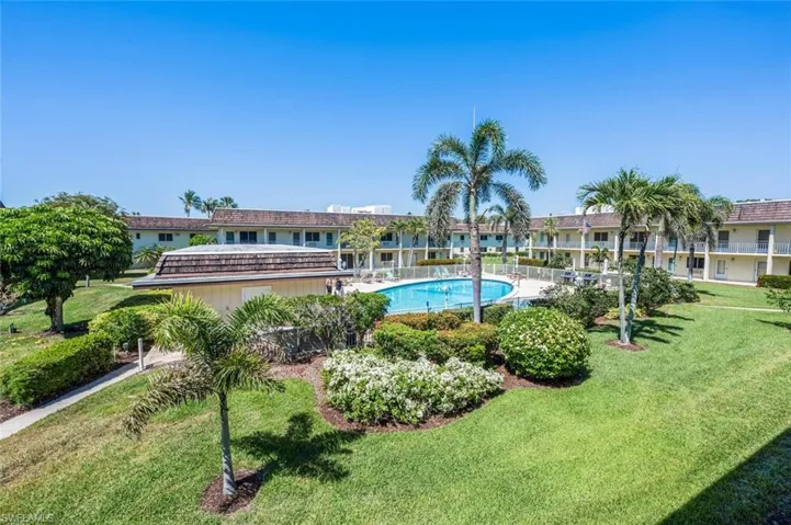Community pool with a yard