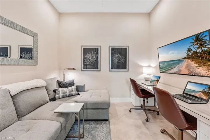 Office with built in study area and baseboards