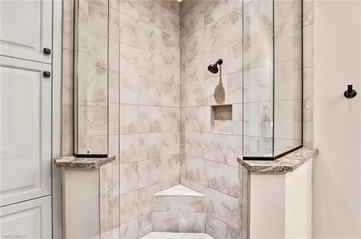 Bathroom with a tile shower