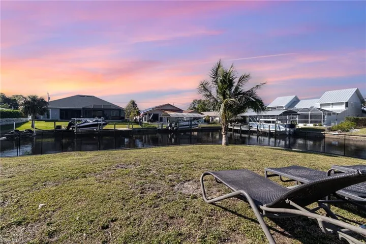 Yard at dusk with a water view