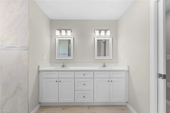 Bathroom featuring double vanity