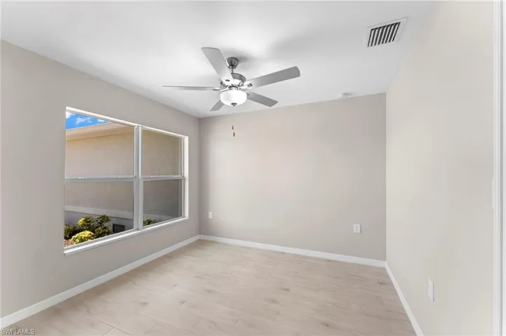 Unfurnished room with ceiling fan