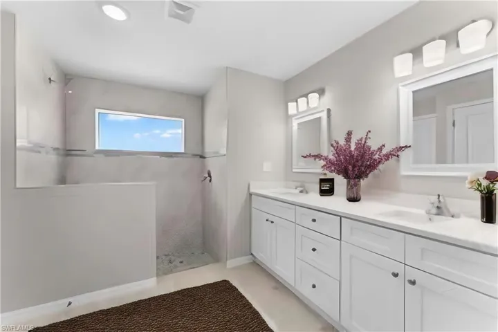 Bathroom with dual bowl vanity