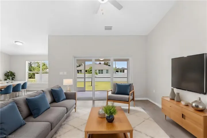 Living room featuring ceiling fan