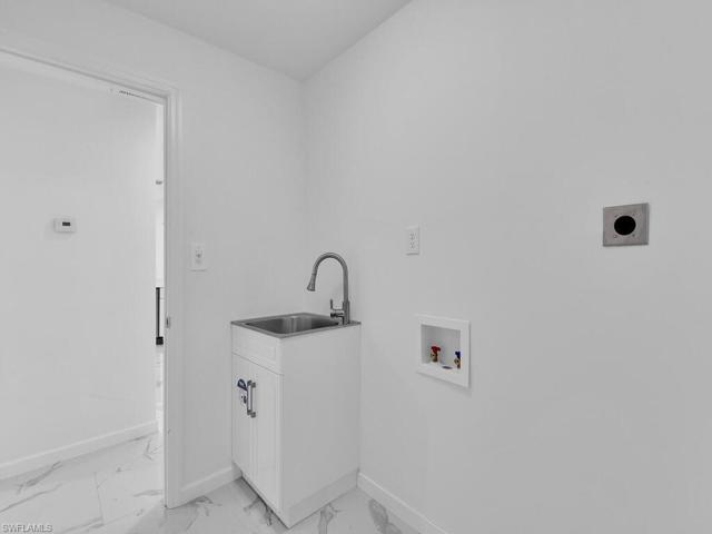 Laundry Room w/ Utility Sink