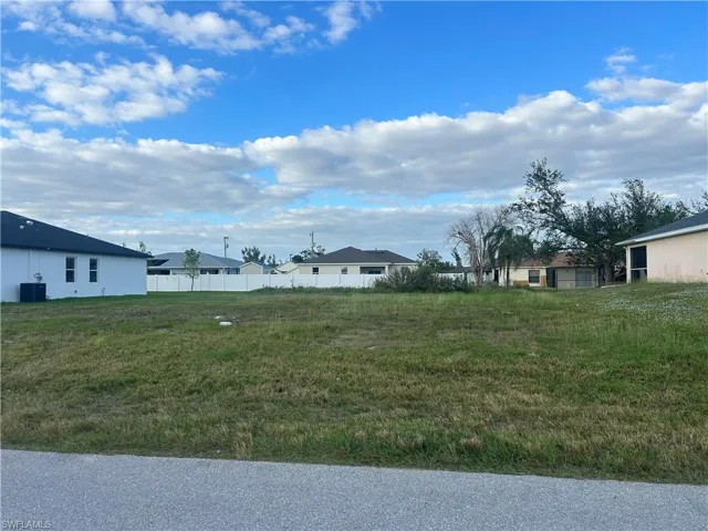 View of yard with cooling unit