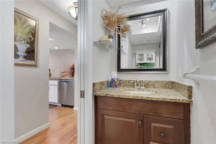 Bathroom featuring vanity and light wood-type flooring