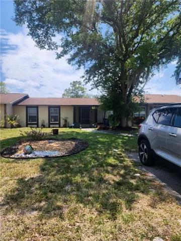 View of front of home featuring a front yard