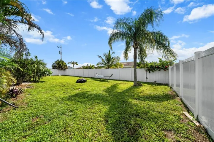 View of fenced backyard