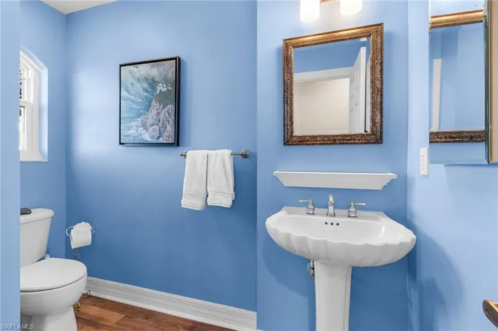 The main living area includes a convenient powder room.