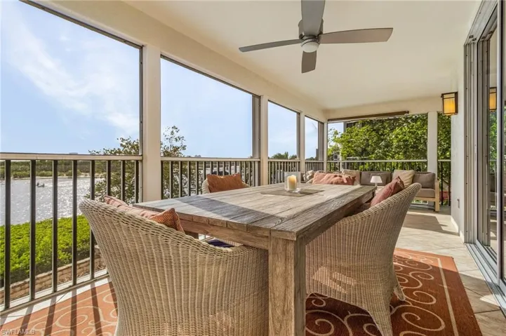 This is the spot from morning to night - The main living level's bayside wrap-around lanai!  Enjoy a hot beverage as you watch the sunrise over the bay, the dolphins and manatees, the Great Blue Herons, the Great and Snowy Egrets, Roseate Spoonbills, even Bald Eagles in your own backyard!