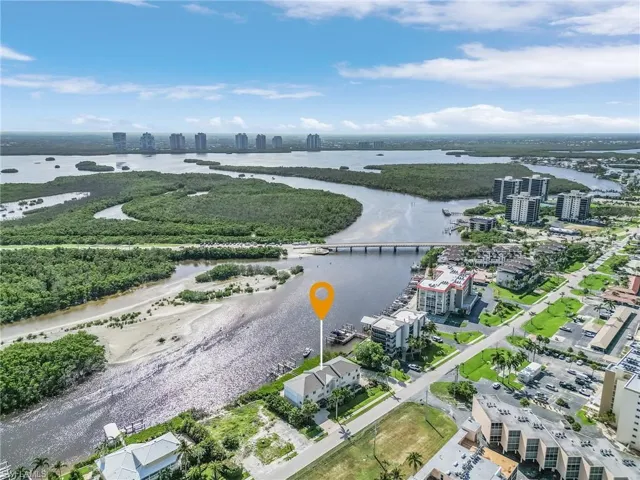 Boaters will love the ease of access to the Gulf to the north or Estero Bay to the southeast from their dock in their own back yard!  This view shows the high-rise towers of Bonita Bay.