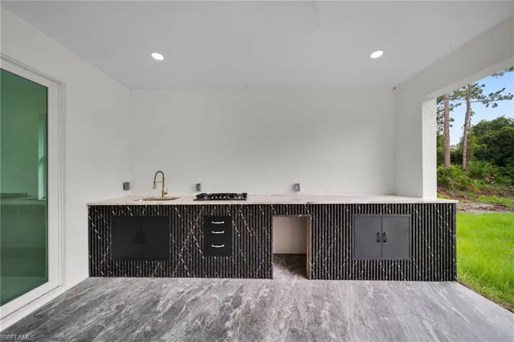 View of patio / terrace with a sink