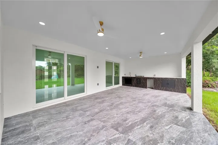 View of patio / terrace featuring an outdoor kitchen