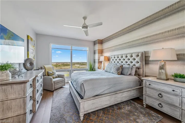 Bedroom featuring dark wood-style flooring