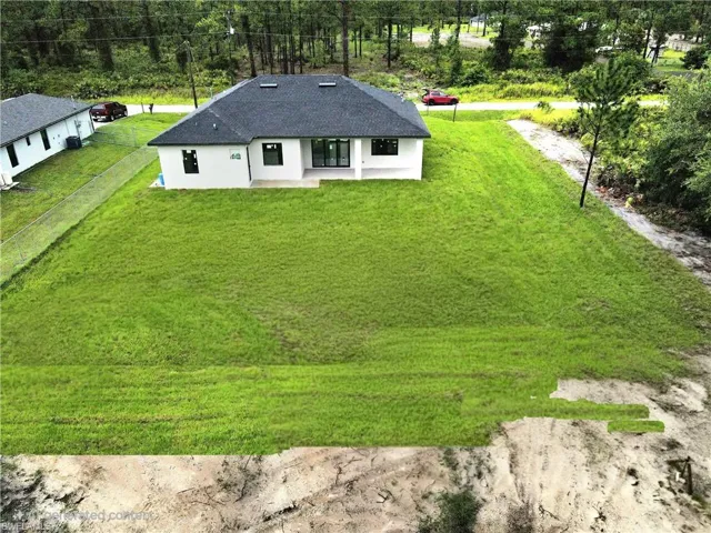 Aerial view of property and surrounding area