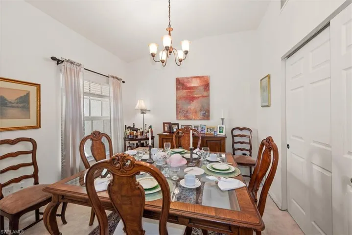 Third Bedroom currently staged as dining area--includes window and closet