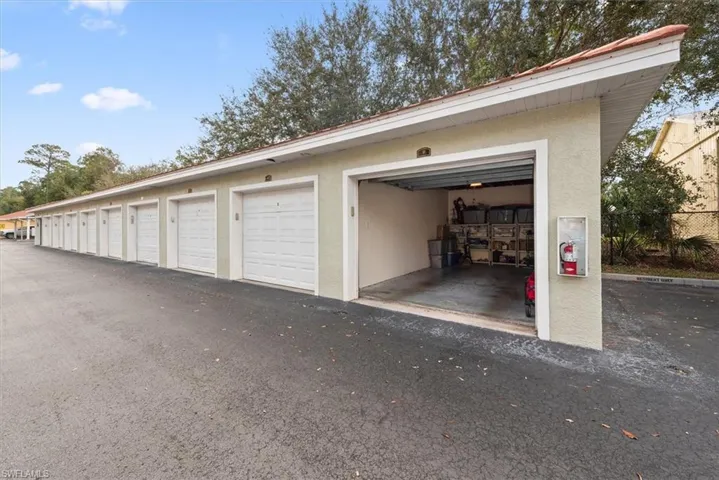 End unit garage with remote controlled access and keypad entry.