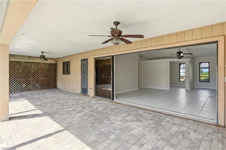 View of patio with a ceiling fan