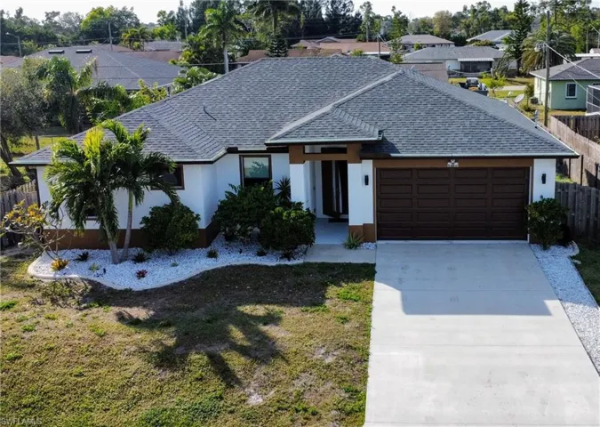Single story home with a garage